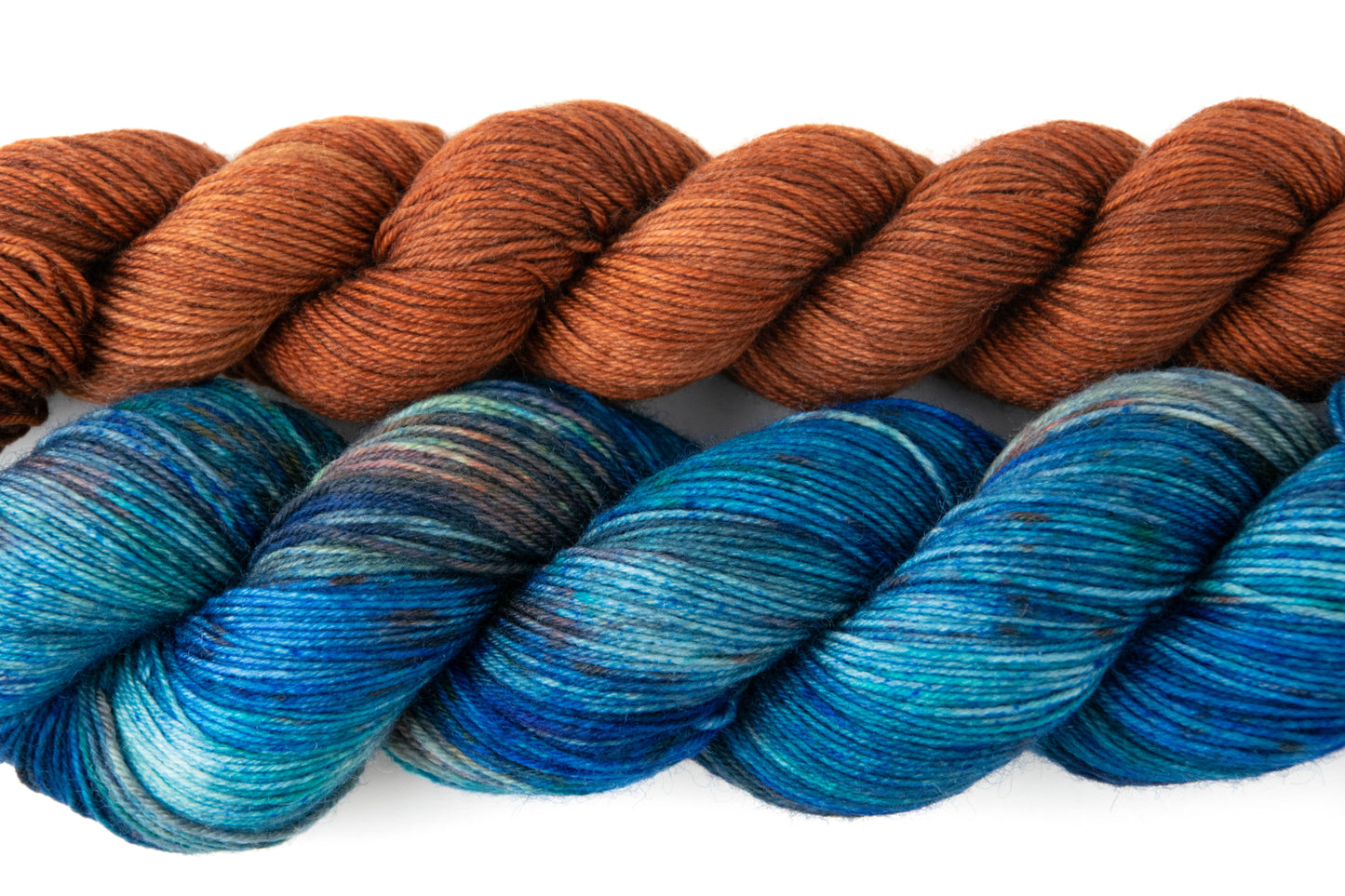 Detail view of the tonal and variegated textures of each of the yarns.