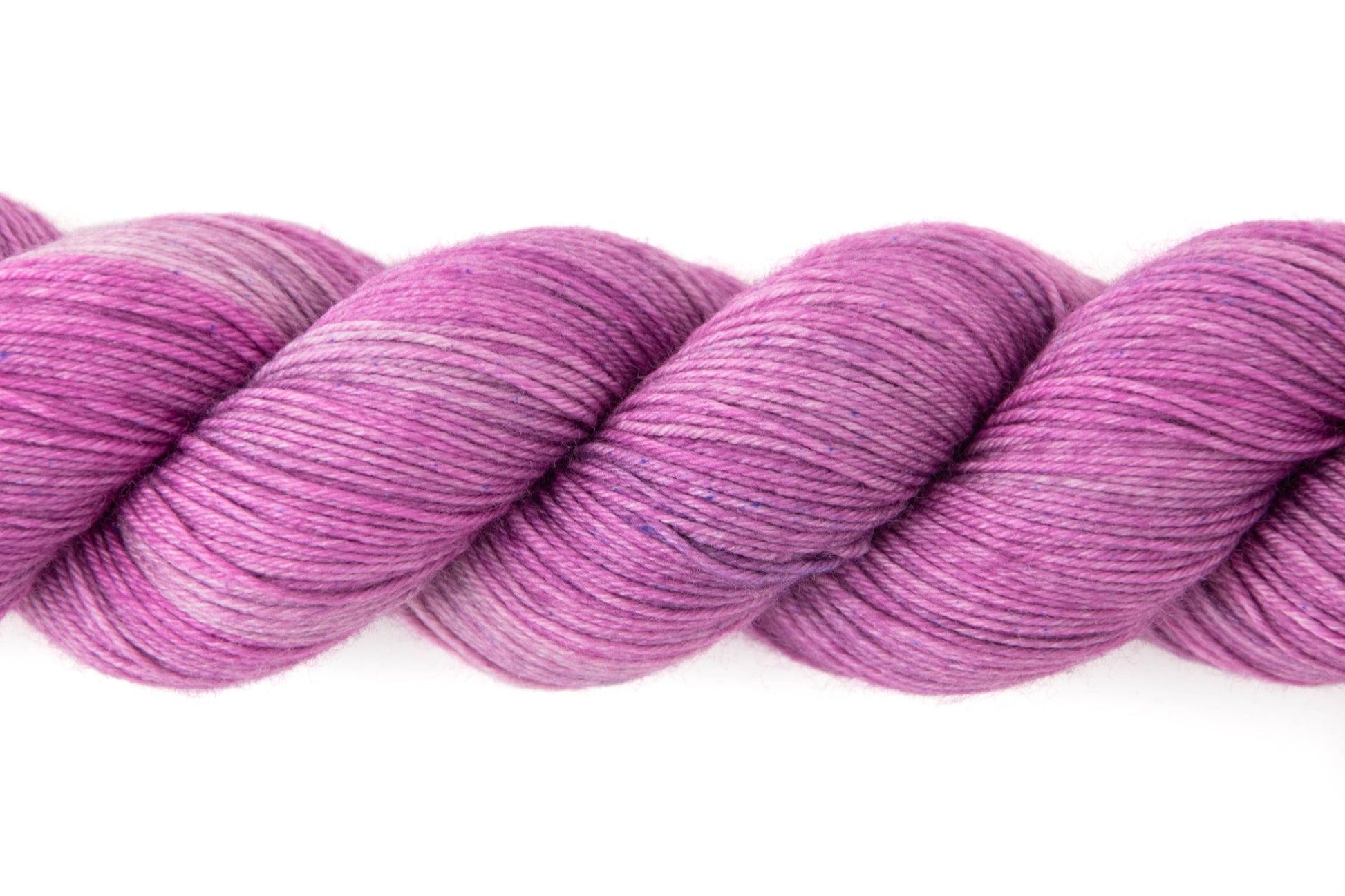 A close view of When All Is Said and Done, showing tonal variations in color and tiny blue microspeckles.