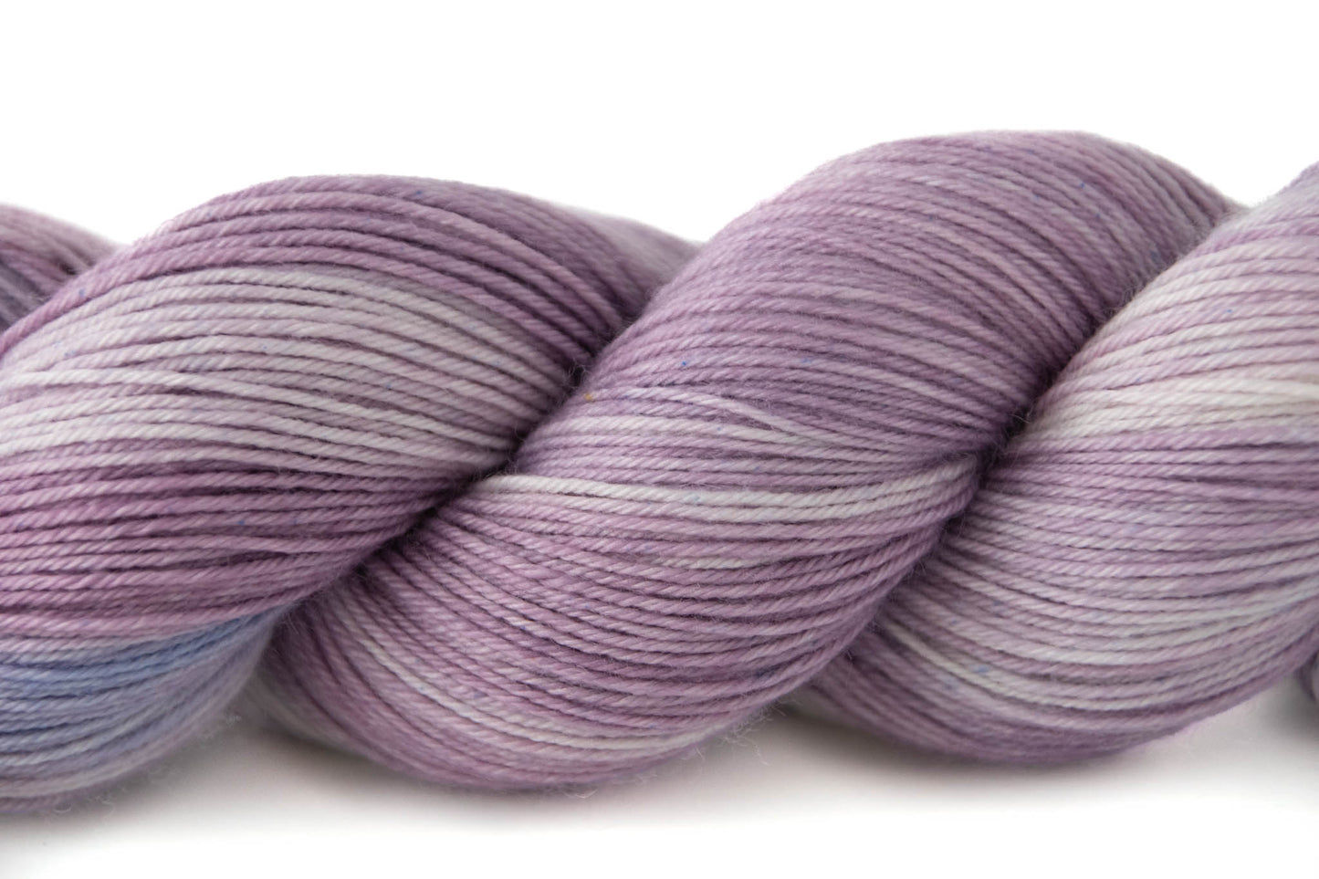 A closeup of lighter and darker sections of purple with a small section of blue.