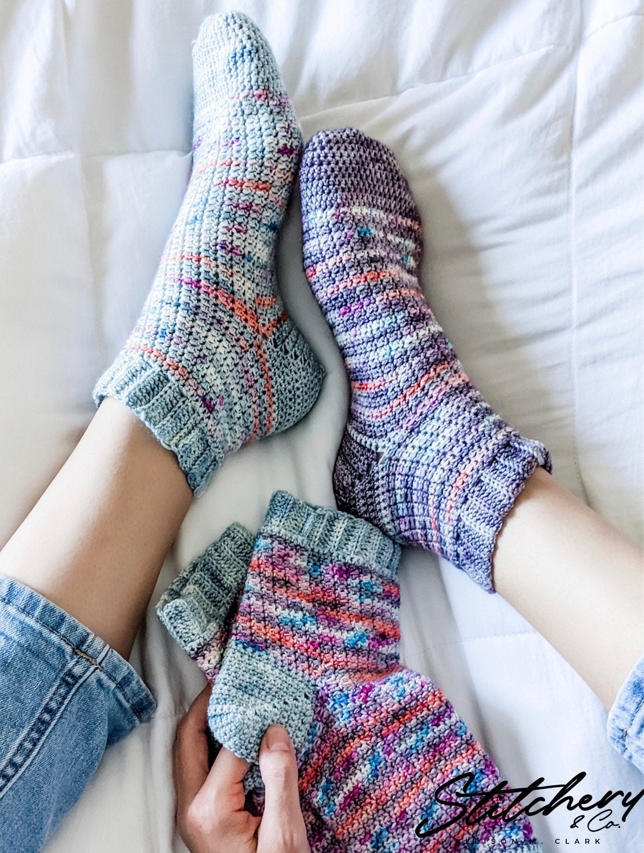 Socks created by Alison of Stitchery and Co using our Edgar Allan Poe, Blue Ridge, and Teresina hand-dyed yarn colorways.