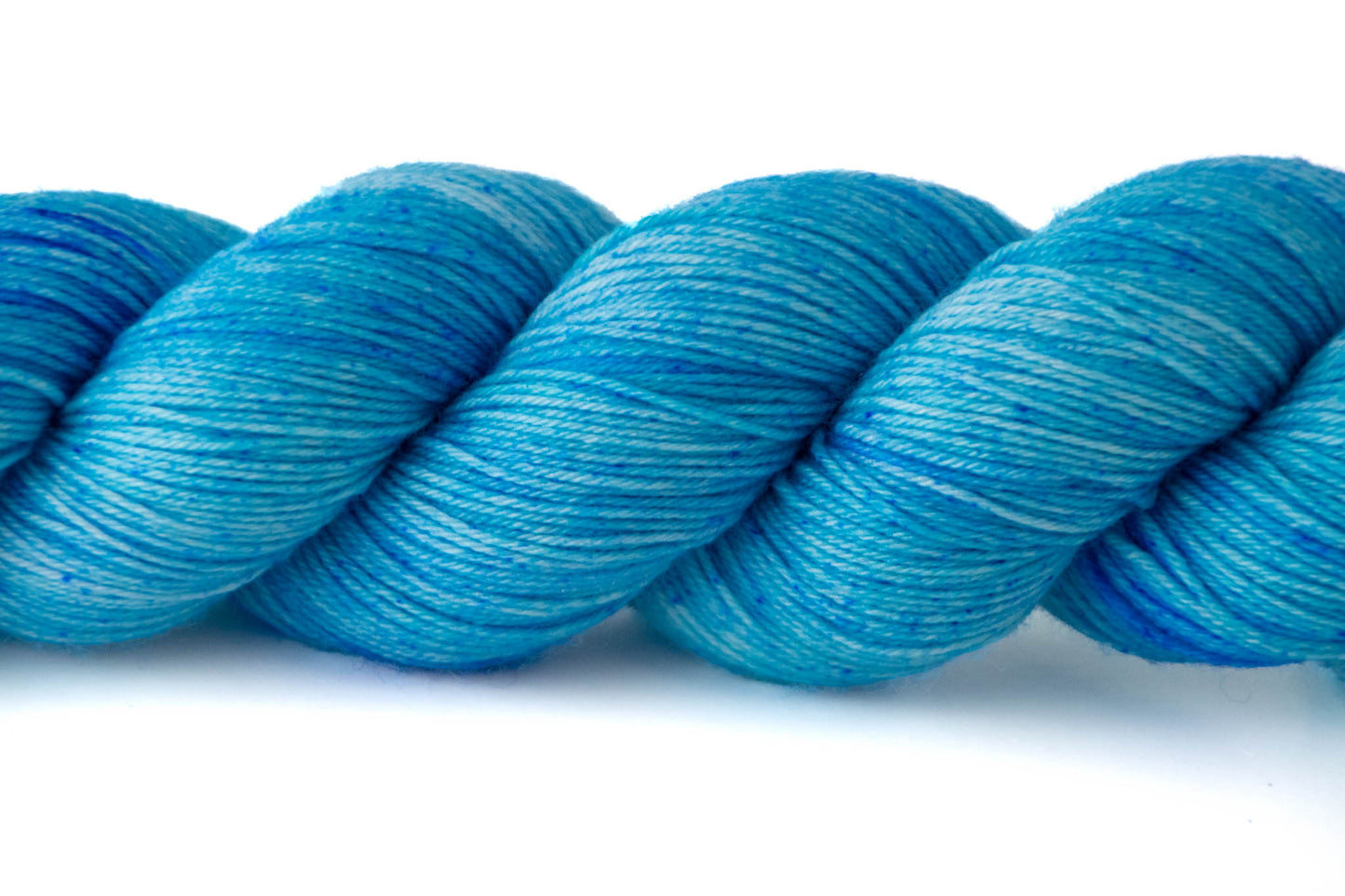 Closeup on the tonal qualities of the Blue Doily colorway.