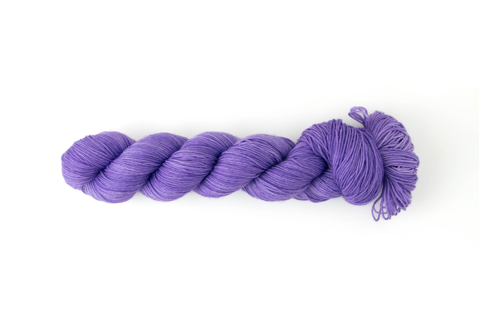 A skein of tonal purple yarn.