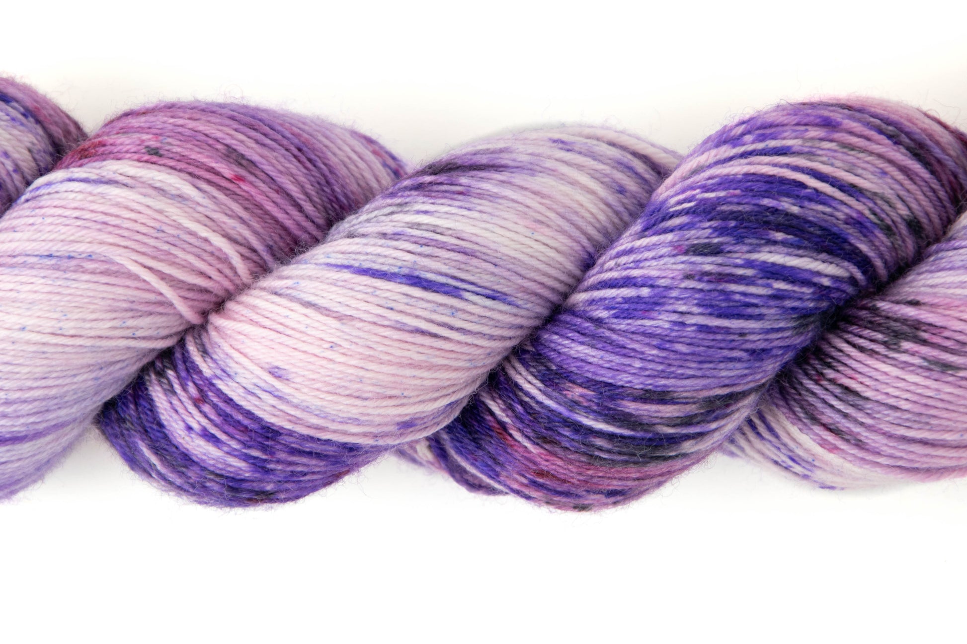 Close view of the various colors of purple on the skein.