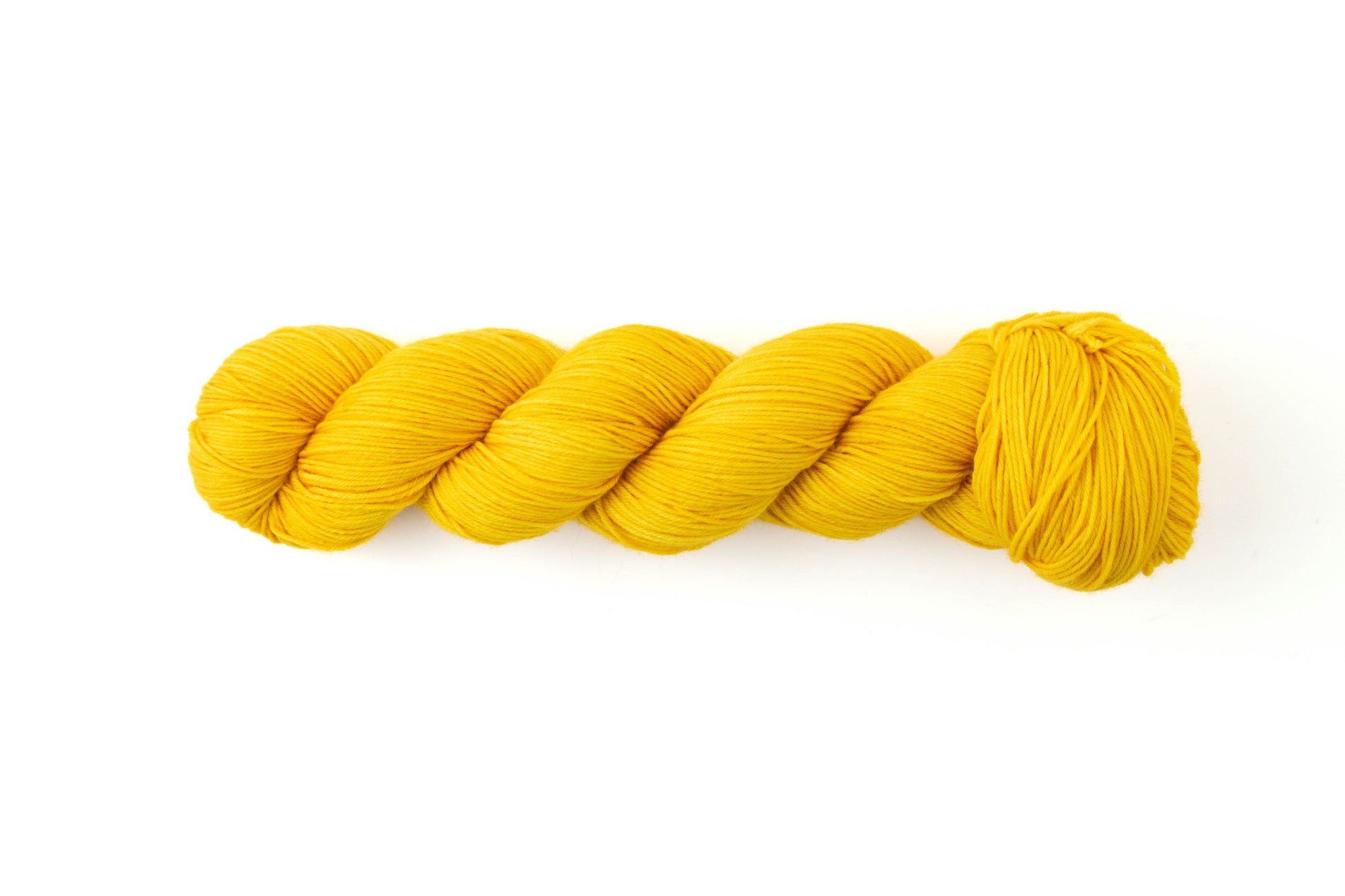 A skein of bright yellow yarn.