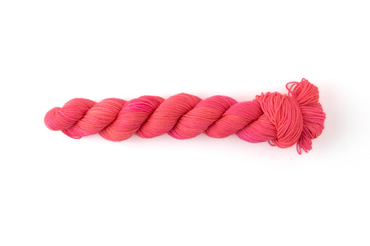 A skein of neon pink yarn.