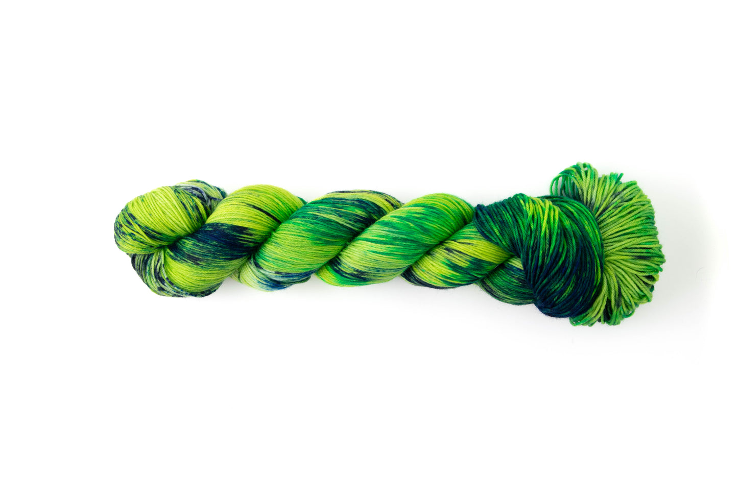 A bright skein of neon green with sections of dark navy and a bluish green.