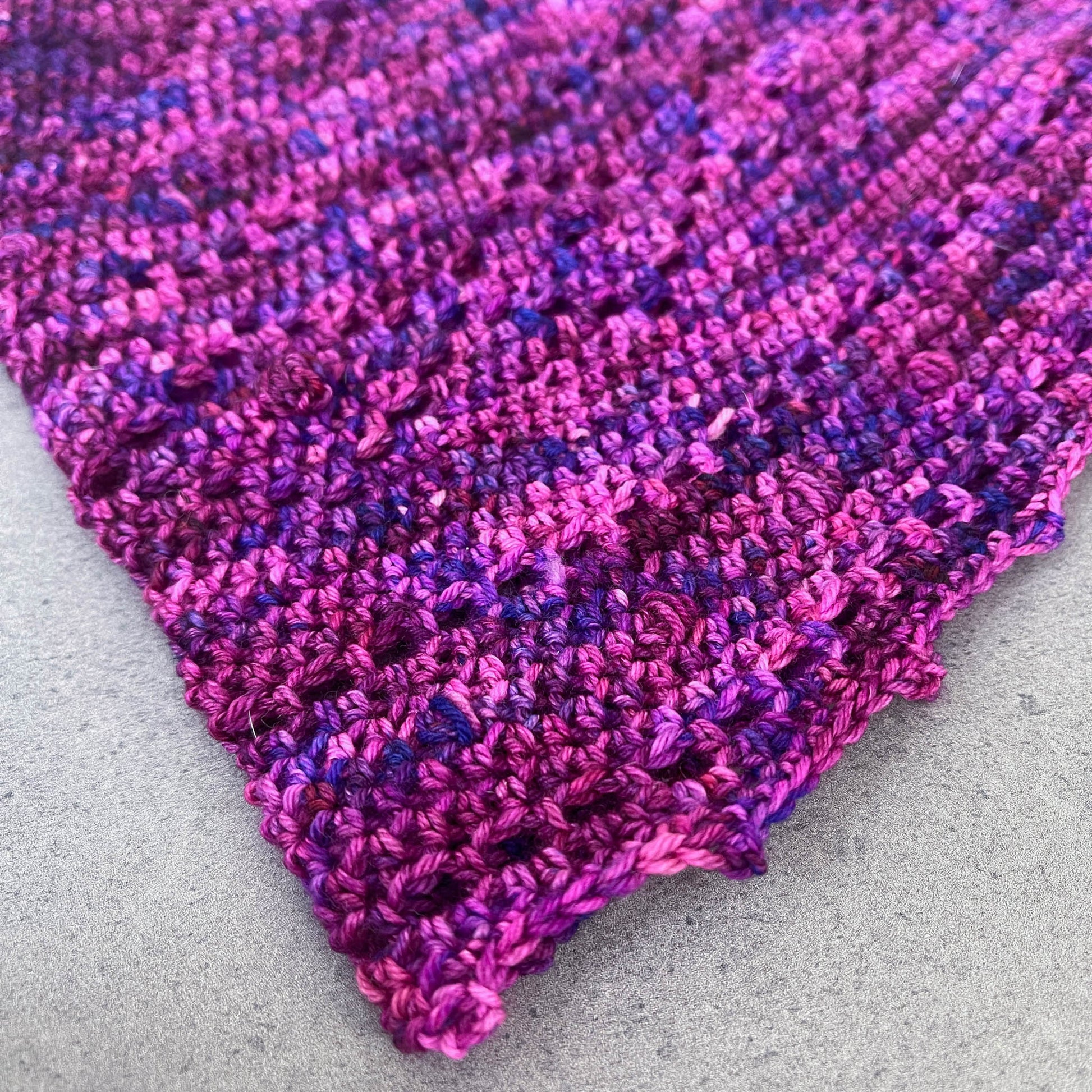 Sections of a crochet cowl with a picot border.